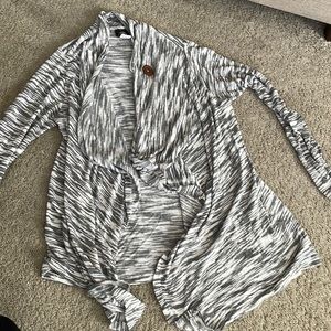 Black and white sweater size medium.
